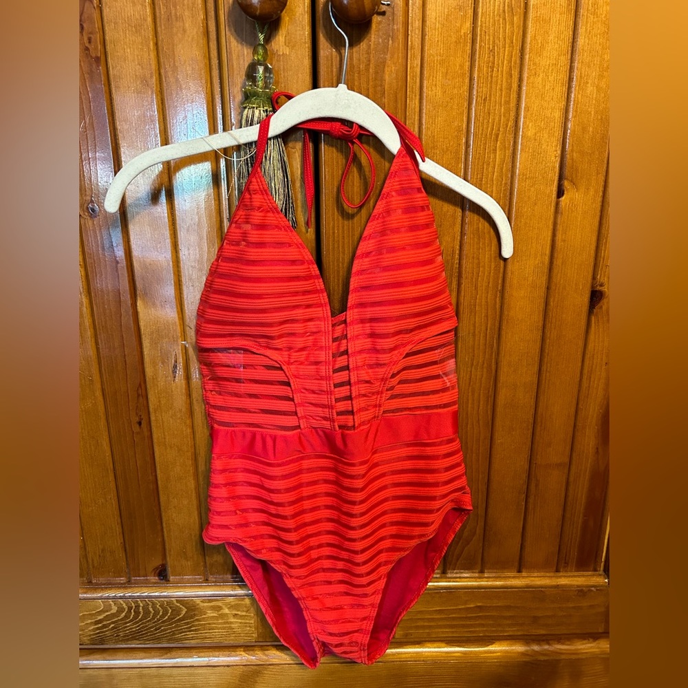 Large orange one piece swimsuit.